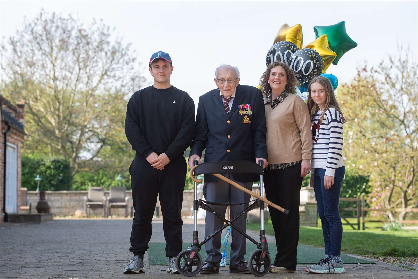 Captain Tom Moore and family at his home in Marston Moretaine, Bedfordshire (Joe Giddens/PA)