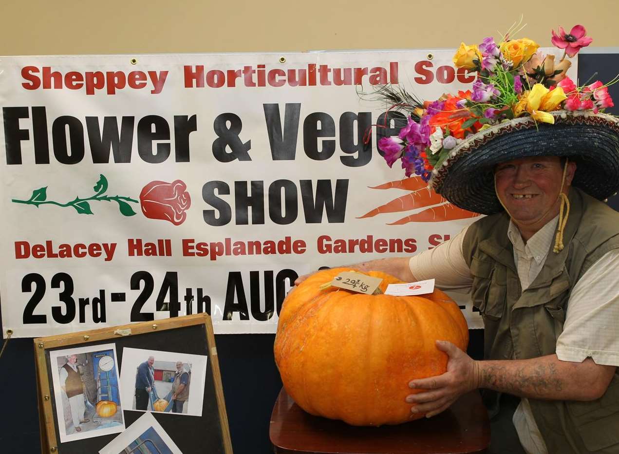 Dave Applegate with Renato Magri's nearly 30kg pumpkin at the Sheppey Horticultural Society's annual show