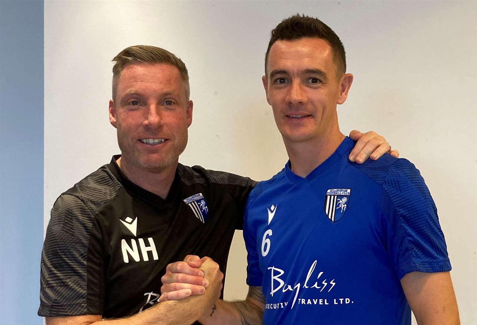 Gillingham manager Neil Harris with his captain for 2023/24, Shaun Williams