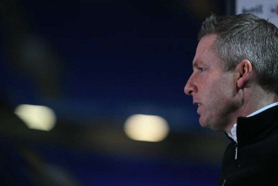 Gillingham manager Neil Harris has welcomed a breather from competitive action this week