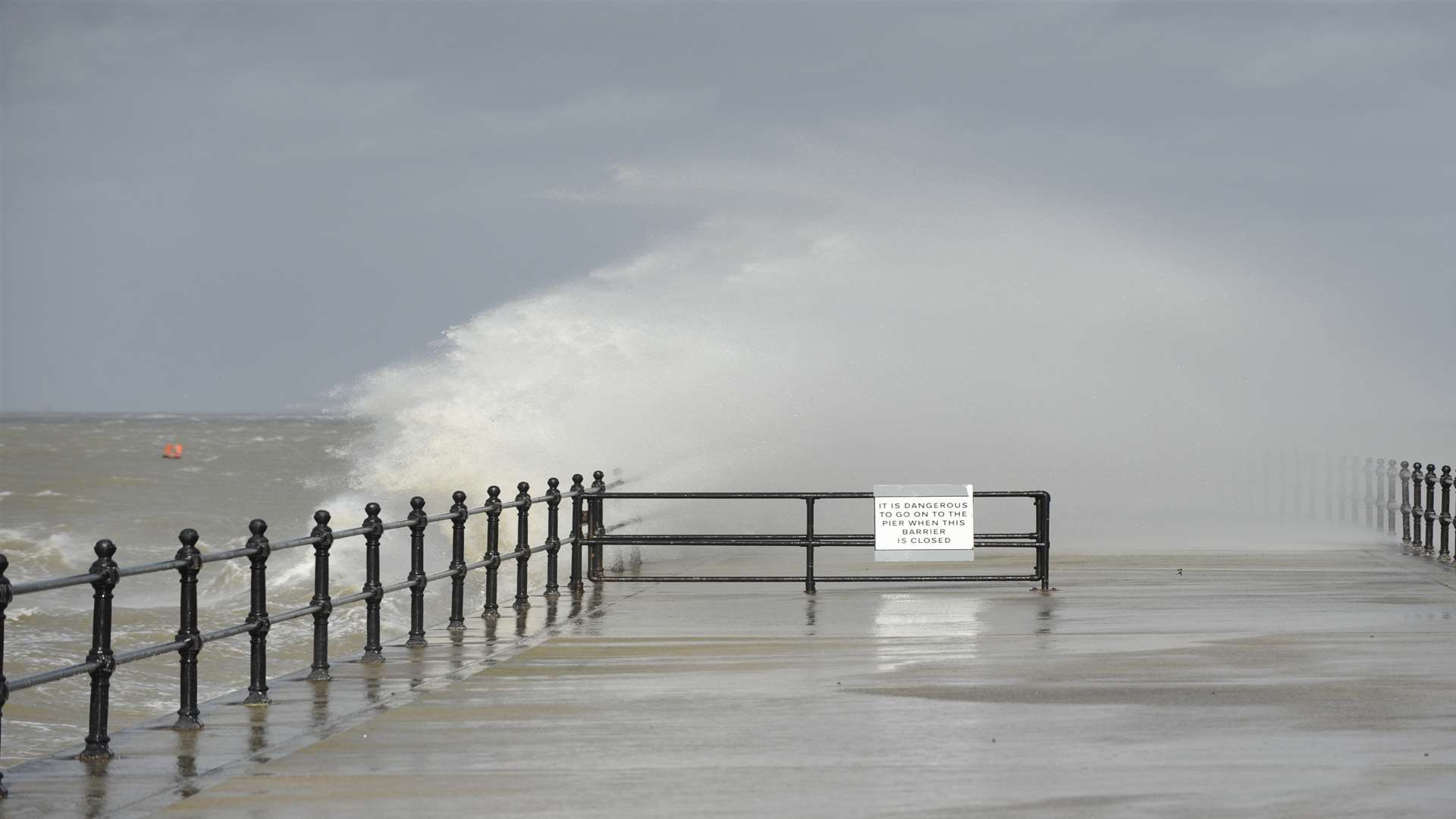 Waves crash over Hampton Pier in Herne Bay. Picture: Tony Flashman.