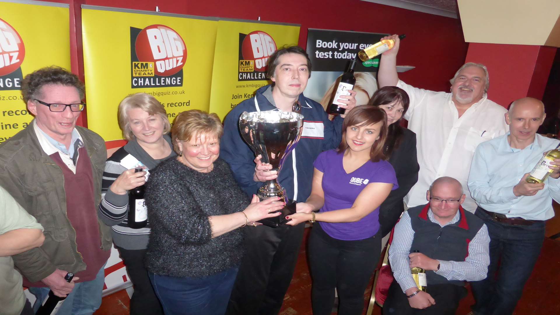 Medway Big Charity Quiz champions Supernova are presented with the Big Quiz trophy by key partners Specsavers and Qube Recruitment at St. George's Hotel, Chatham