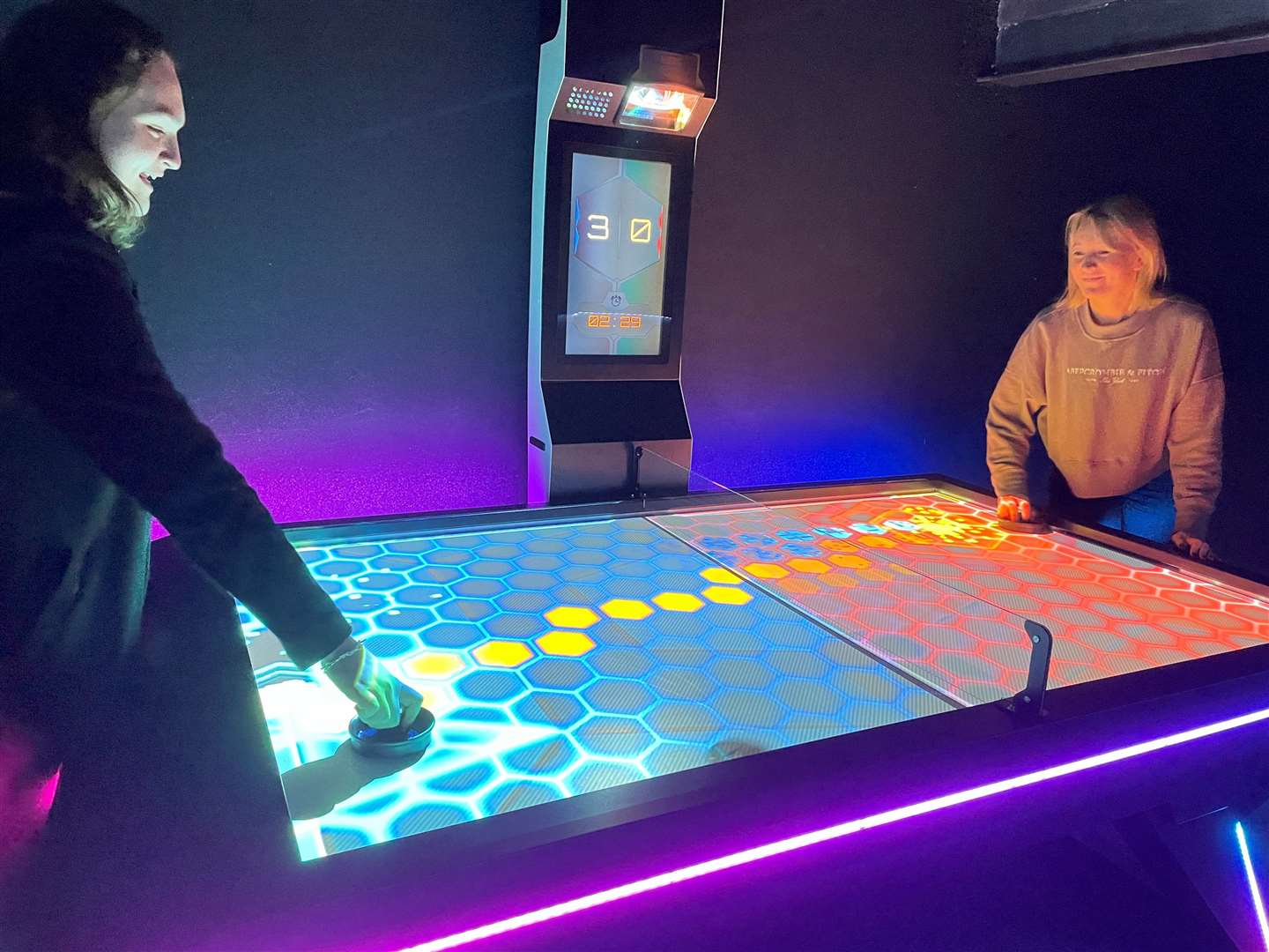 The augmented reality air hockey in action