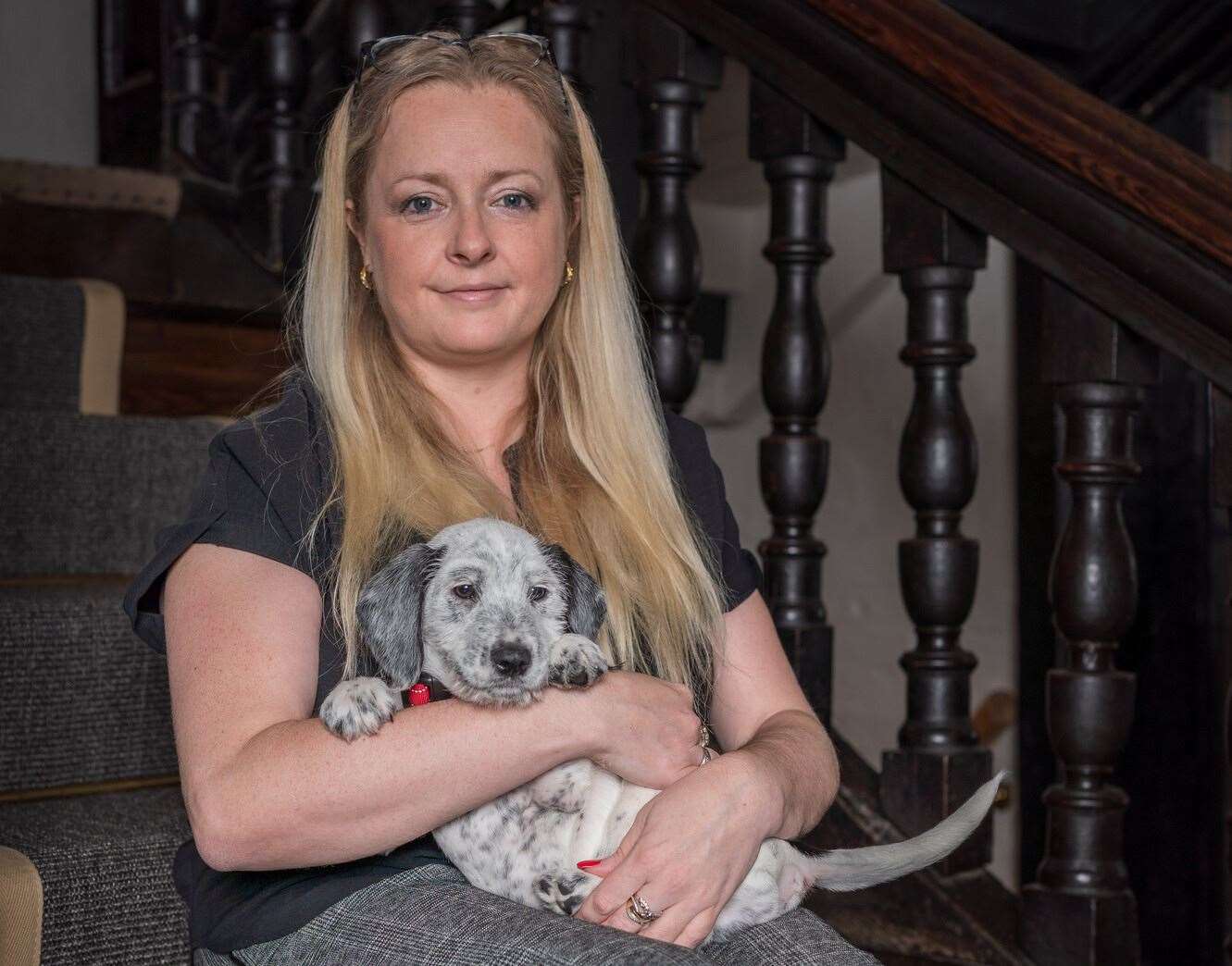 Victoria Ruffell with her new puppy called George. Picture: Shepherd Neame