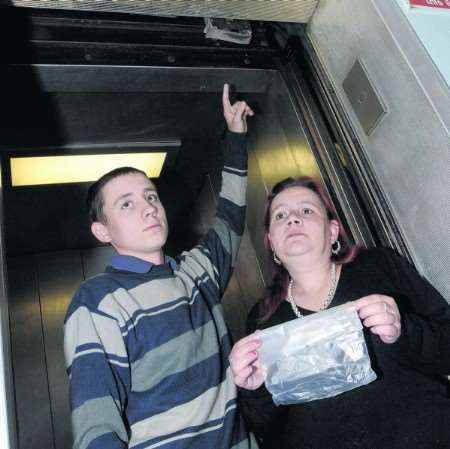 Matthew Scott, 16 and mum Jill Ducker with the needle that fell on him. Picture: John Wardley