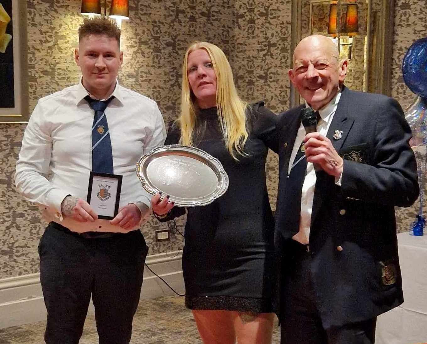 Rowers’ rower and coxswain of the year Will Coleman with club captain Maria West-Burrows and president Nick Bailey
