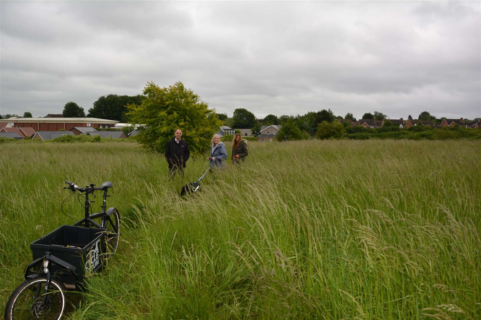 Members of the public enjoying the potential village green at Bunyards Farm