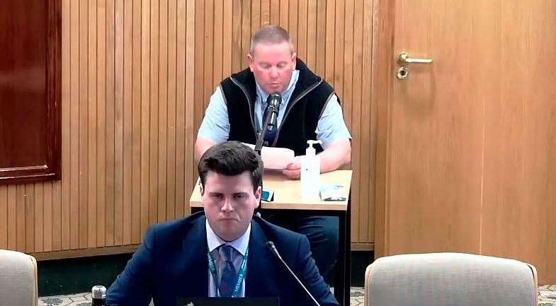 The applicant Charles Sparrowhawk to the rear with Cllr James Osborne-Jackson in the foreground Credit: Sevenoaks District Council