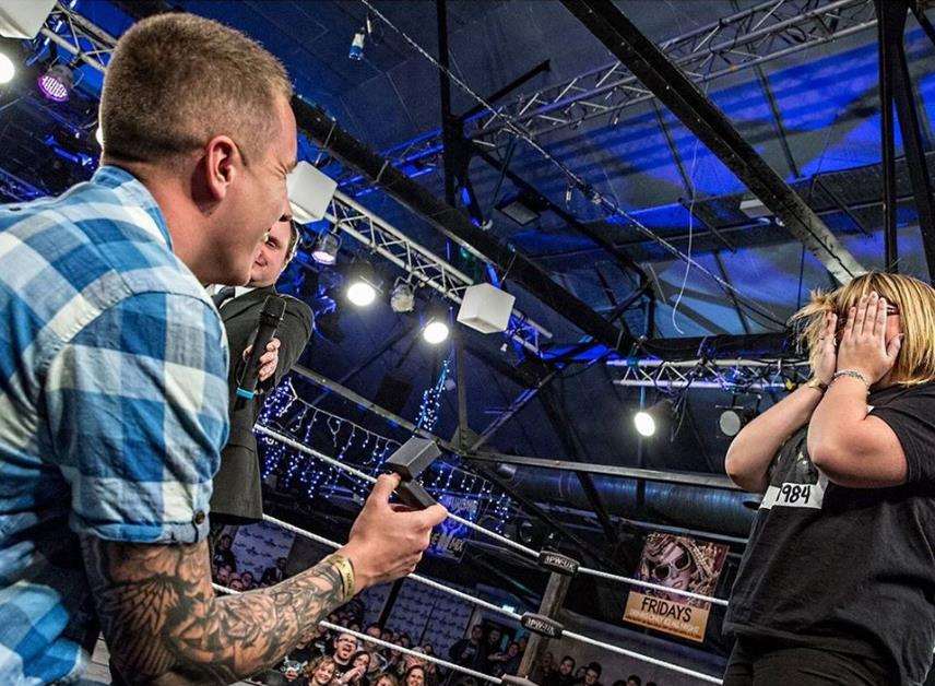 Paul Mashiter surprised Becky Dolby when he proposed to her at a wrestling competition. Credit: www.turning-face.co.uk