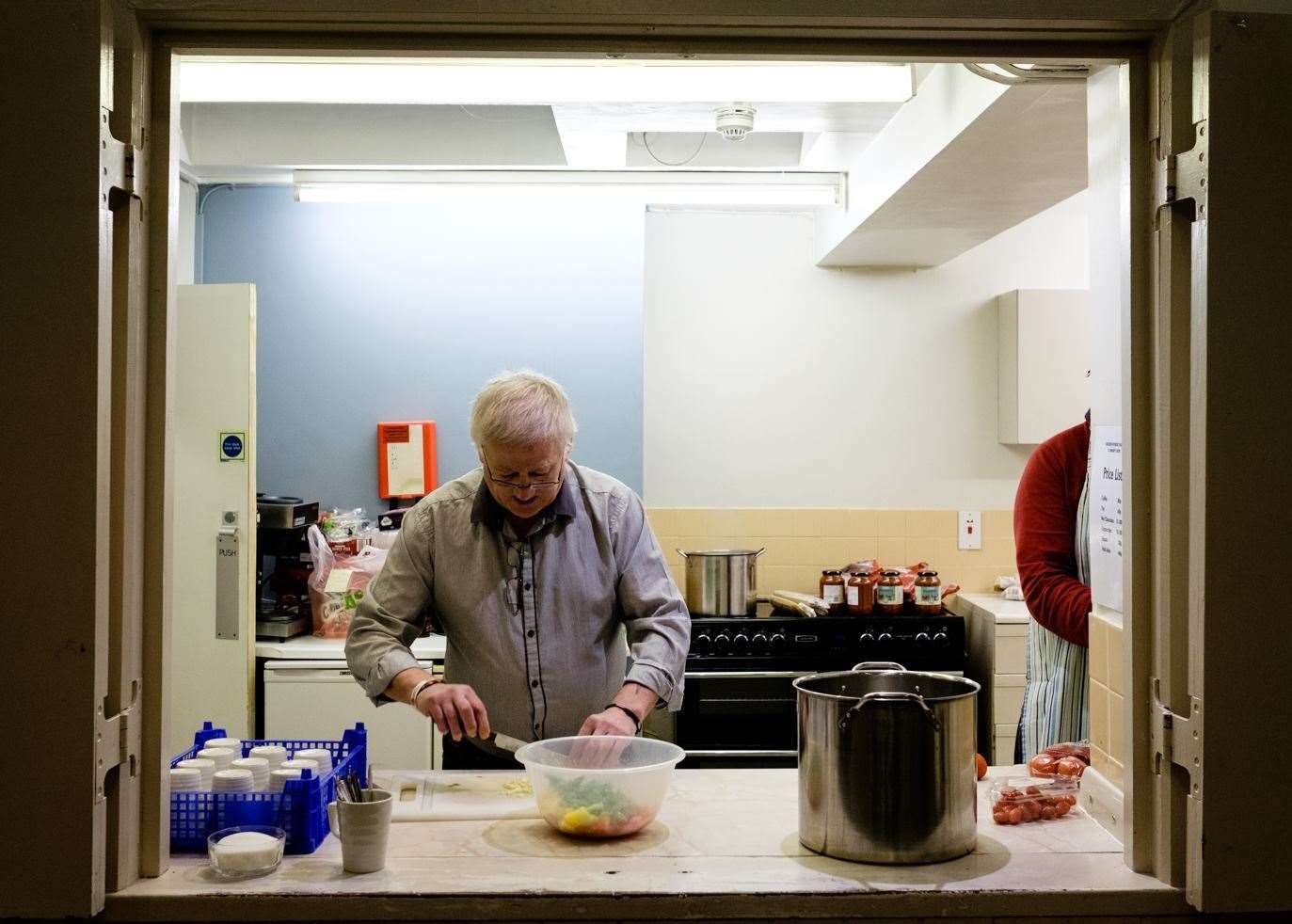 Long standing volunteer, Trevor Blake-Morris prepares a meal at the kitchen facility for the Gravesham Sanctuary