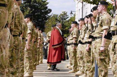 Cllr Brian Mortimer meets soldiers from the 2nd Royal Tank Regiment ahead of their parade through the streets of Maidstone