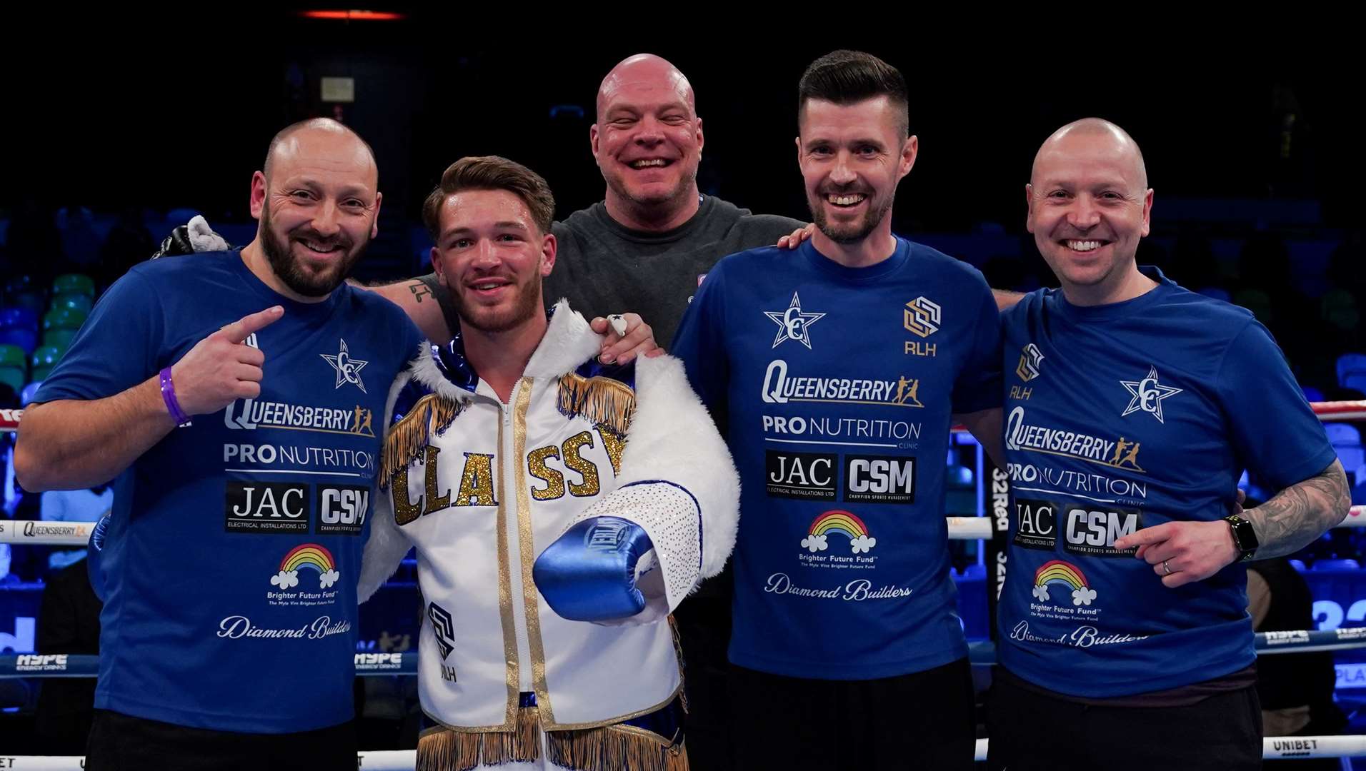 From left, Steve Hickford (coach), Charlie Hickford, Jason Fielding (cutsman), Dan Woledge Snr (coach) and Paul O'Neill (nutritionist) after Hickford’s win over Yin Caicedo. Picture: Stephen Dunkley / Queensberry Promotions
