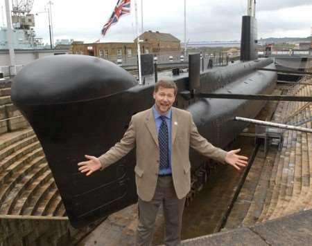Simon Dolby at the submarine HMS Ocelot where the abseil challenge will take place.