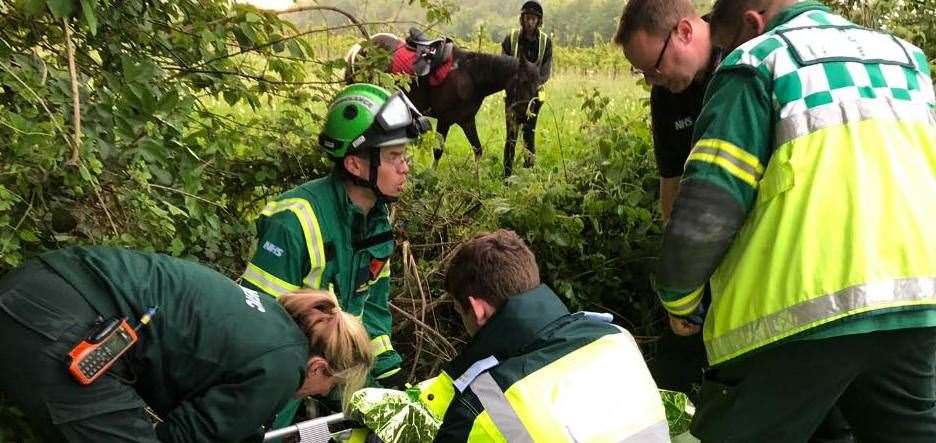 Paramedics treat Emily Manser after falling off her horse in Wateringbury (10793513)