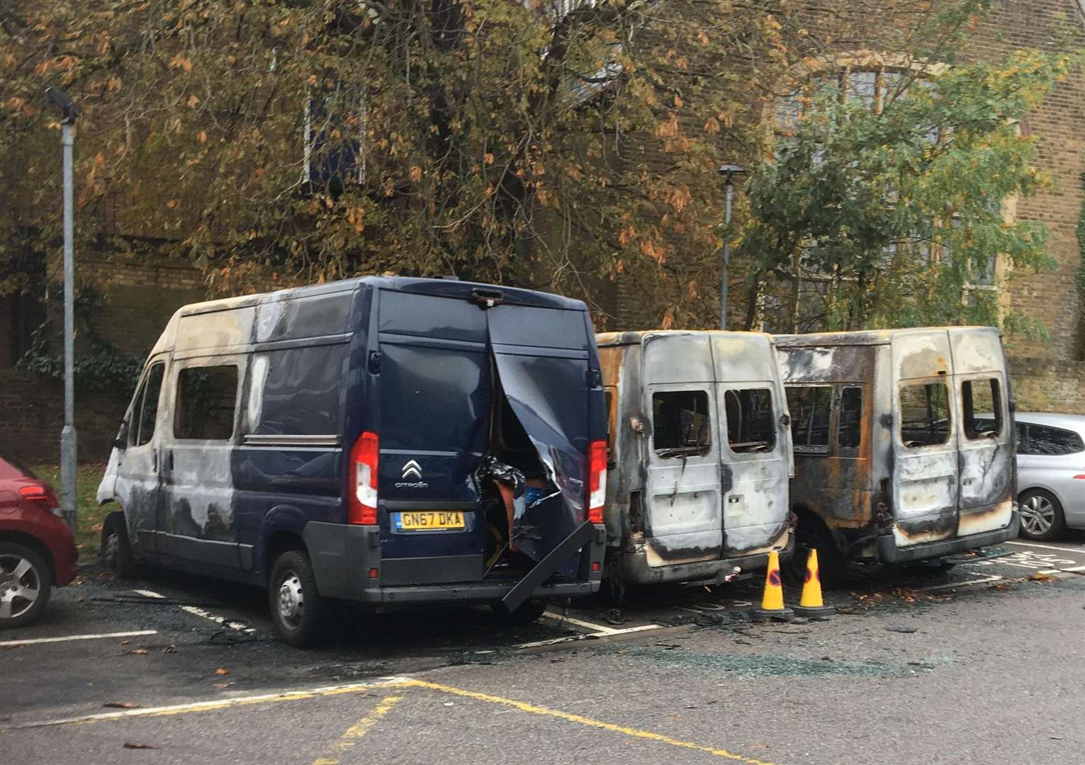 Three minibuses were torched outside Joynes House, Gravesend