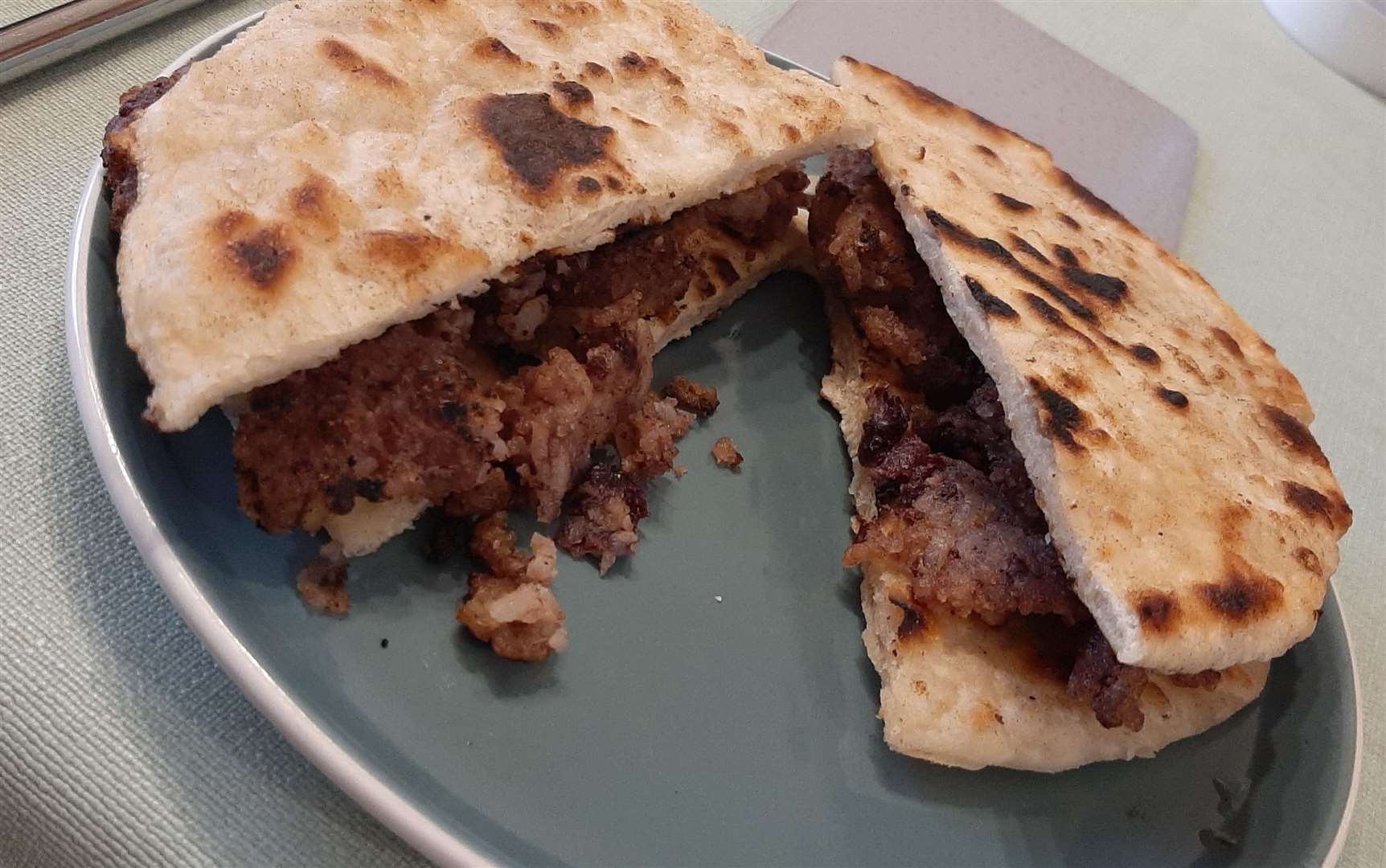 Tofu, rice and kidney bean 'burgers' in flatbread. They quickly became a crumbling mess