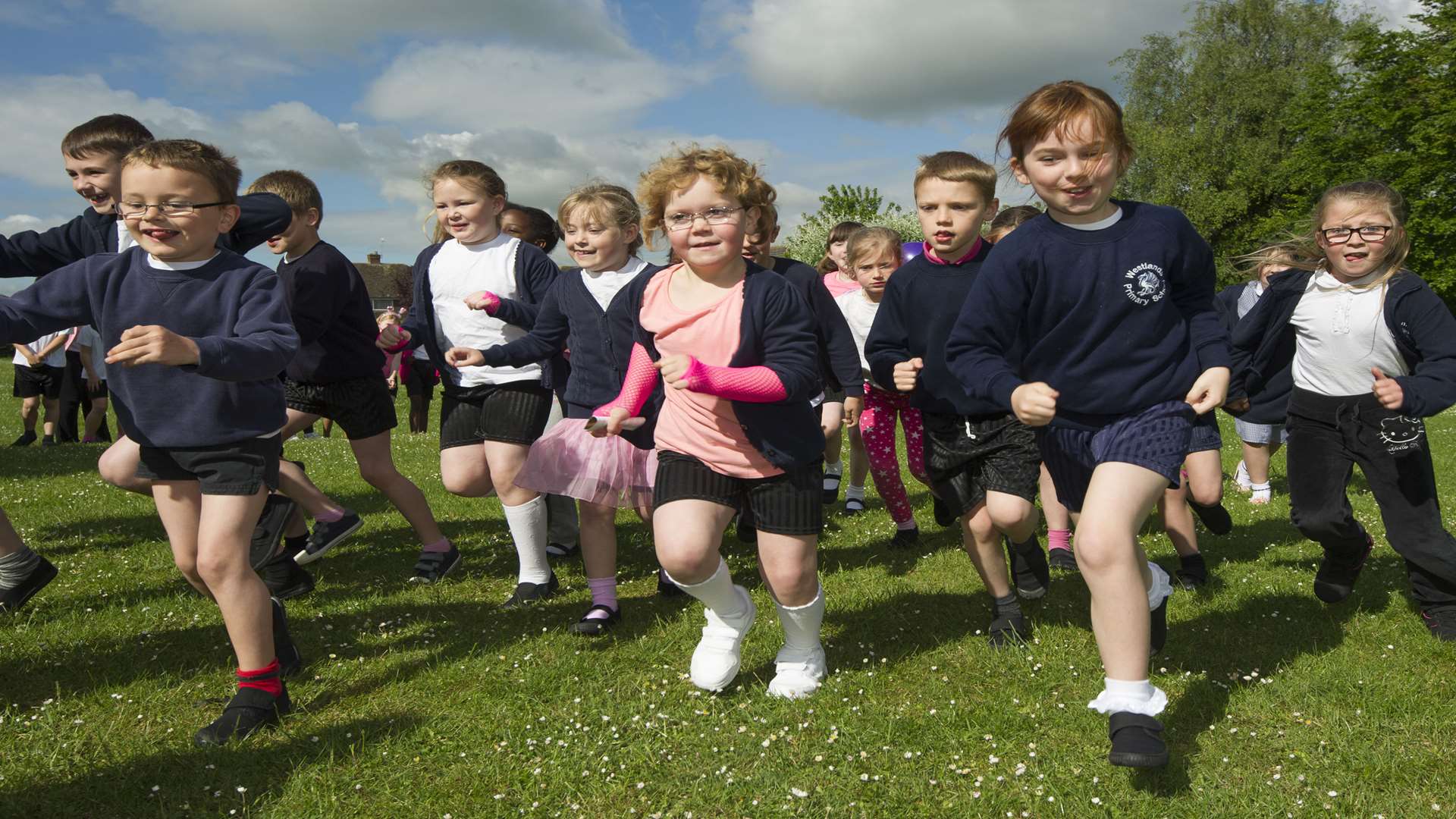 Lillie, centre in pink, sets off with her Opal classmates