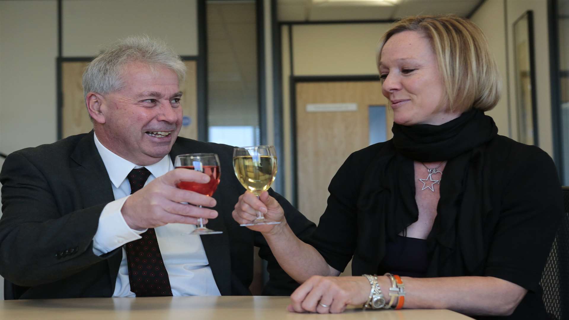 Reporter Alan Smith takes a last drink with Council leader Annabelle Blackmore before starting Dry January