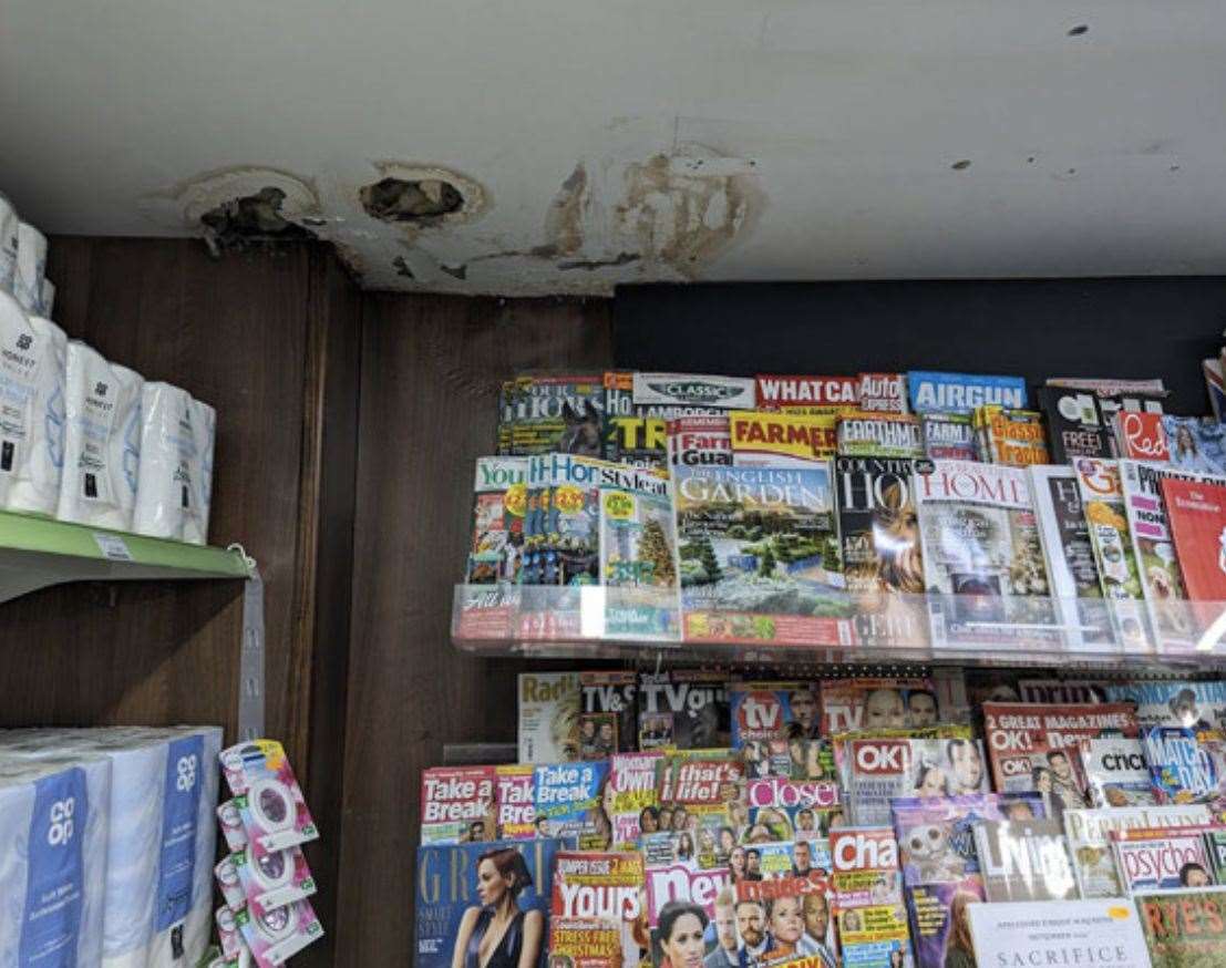 The damaged ceiling in the shop front
