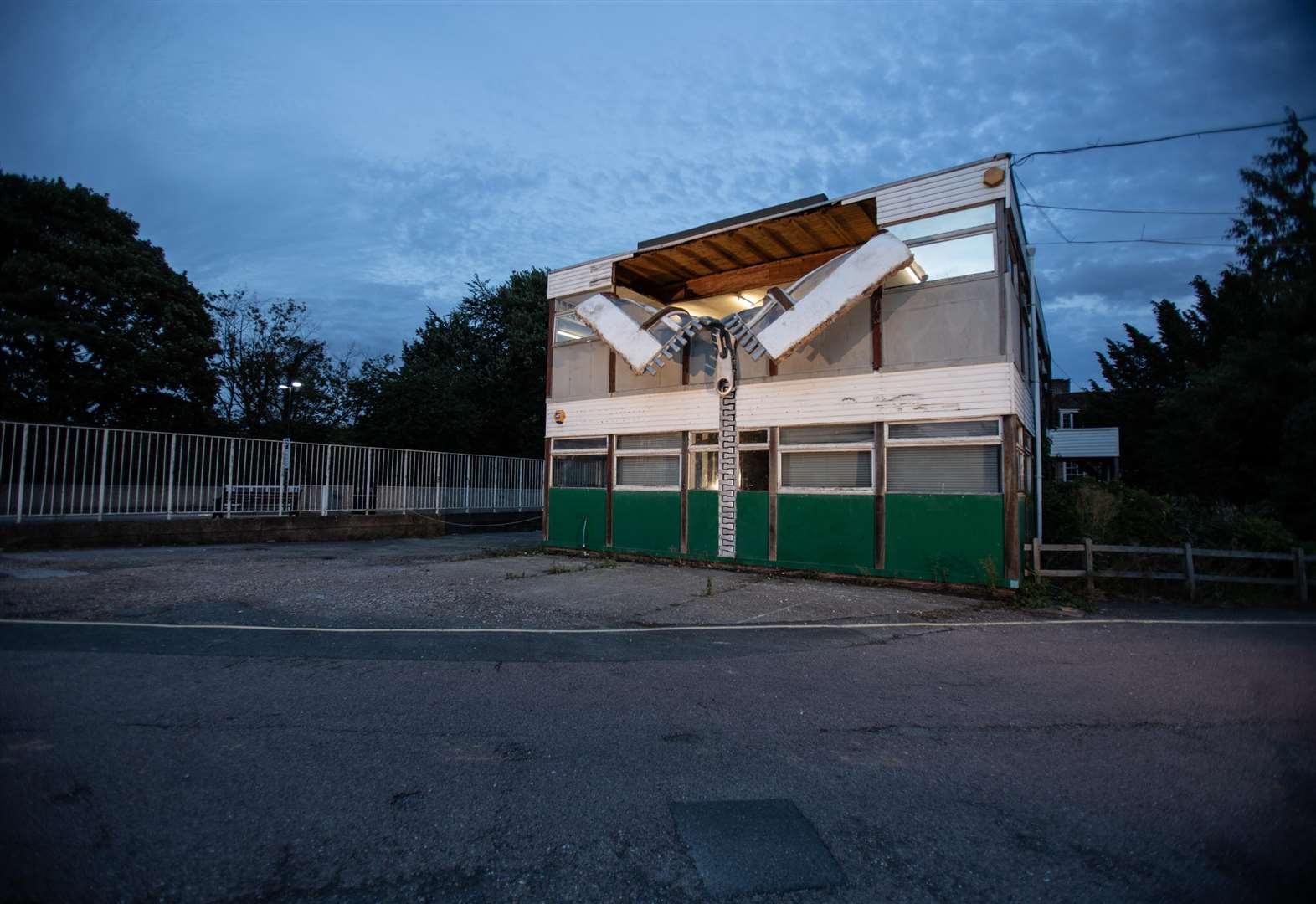 Alex Chinneck's unzipped art installation in Tannery Lane