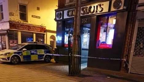 Police outside City Slots in Chatham High Street. Picture: Jay Day