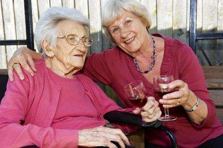 Lydia Eaton, aged 102, with her daughter Eliane (correct) Griffin, in the garden of Newington Court Care Home, Newington.