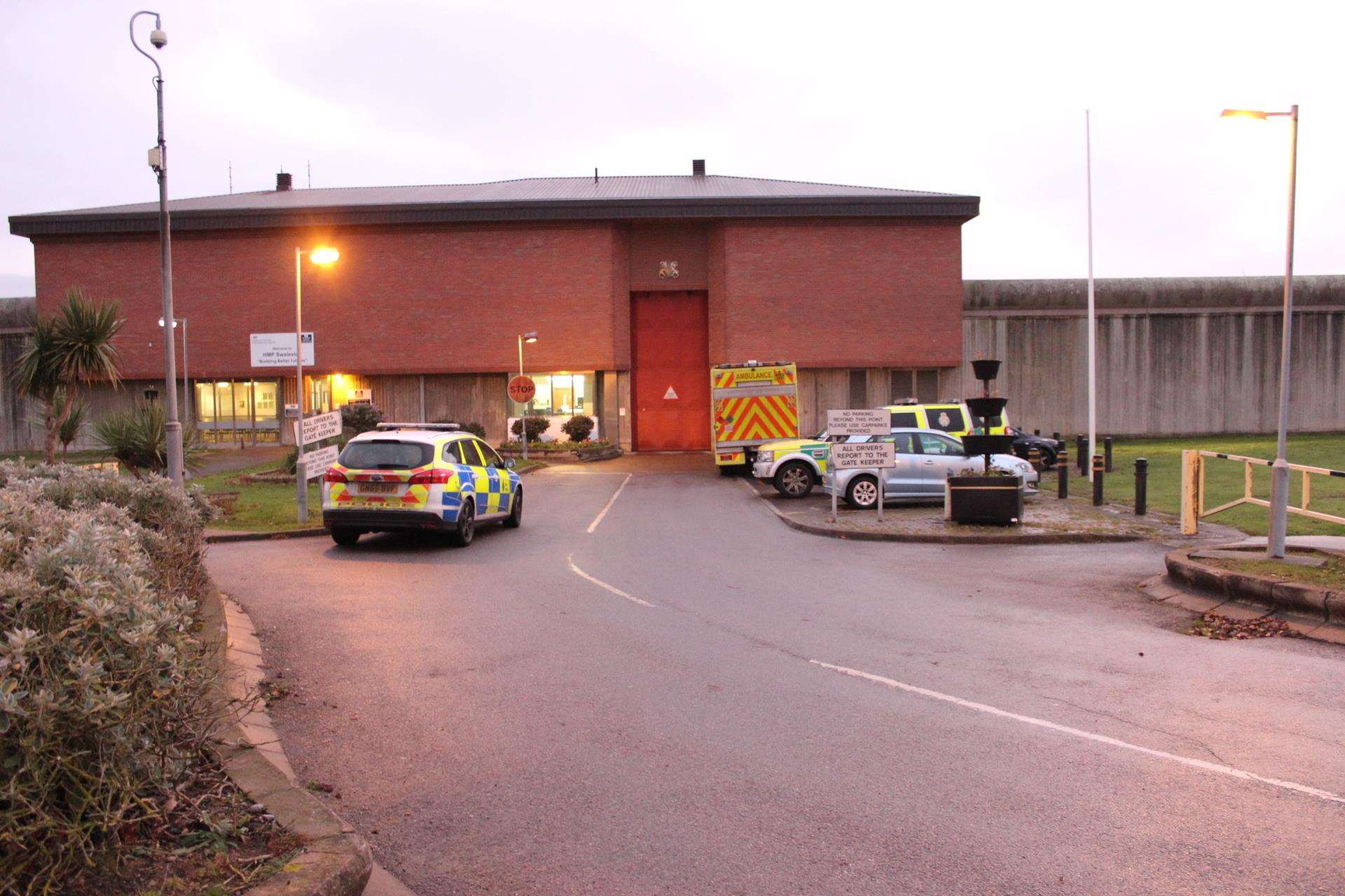 Ambulances on standby during a riot inside HMP Swaleside in Eastchurch, Sheppey, in December last year