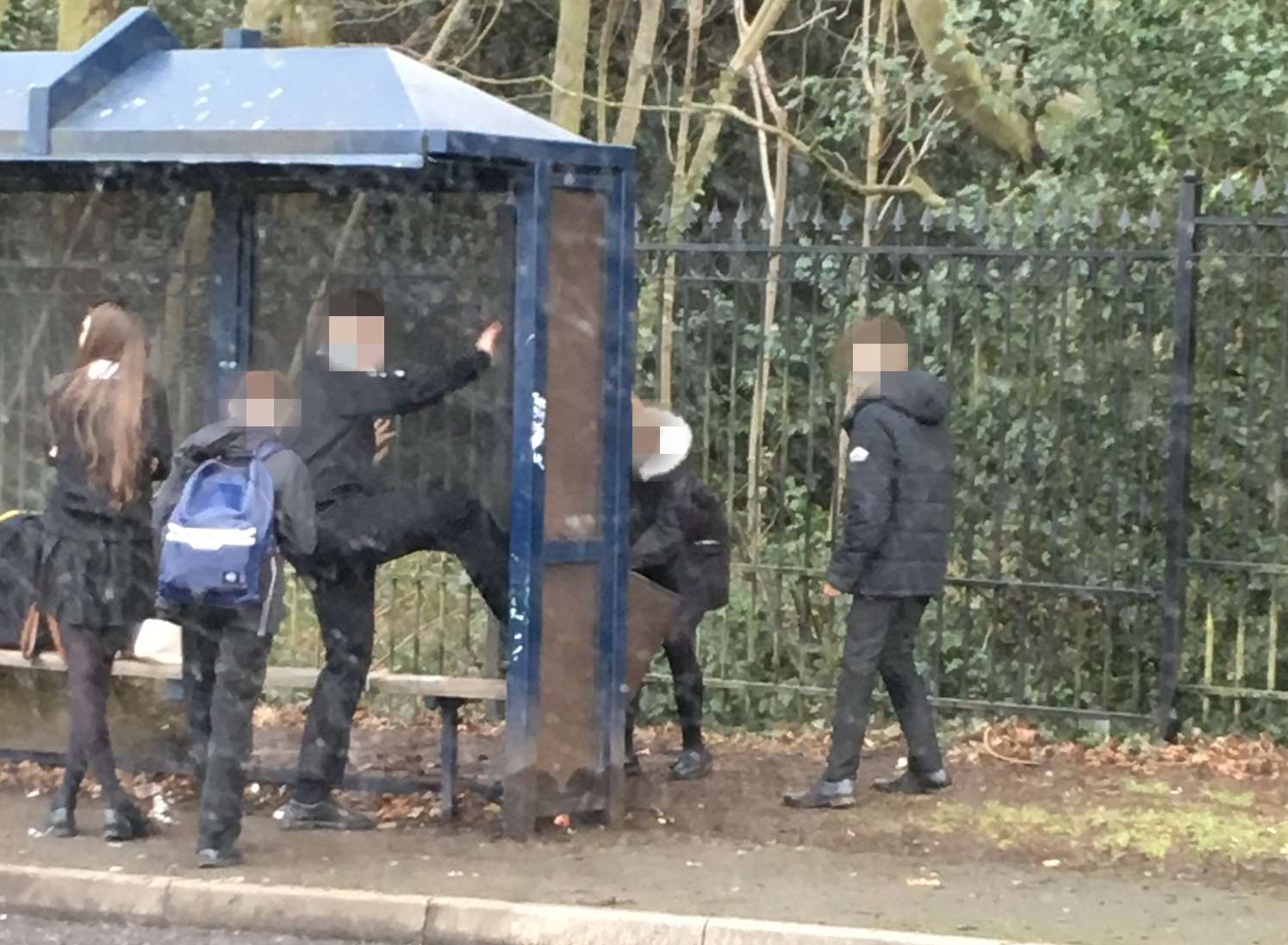 Cornwallis Academy has apologised after some of its student were caught vandalising a public bus shelter.