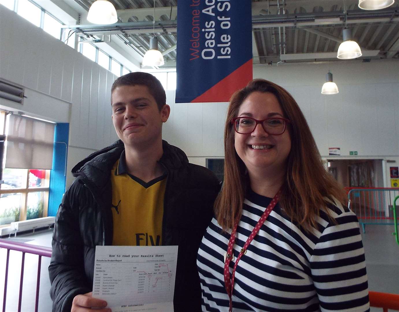 Oasis Isle of Sheppey Academy pupil Bradley Murphy, 16, with his GCSE results alongside teacher Claire Drake