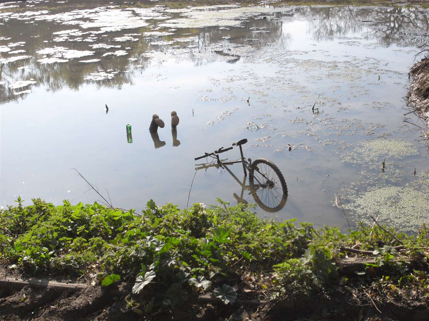 An April Fool's prank appears to show a drunk cyclist in Elmstone village pond in Preston near Canterbury. Image: Oliver Chapman
