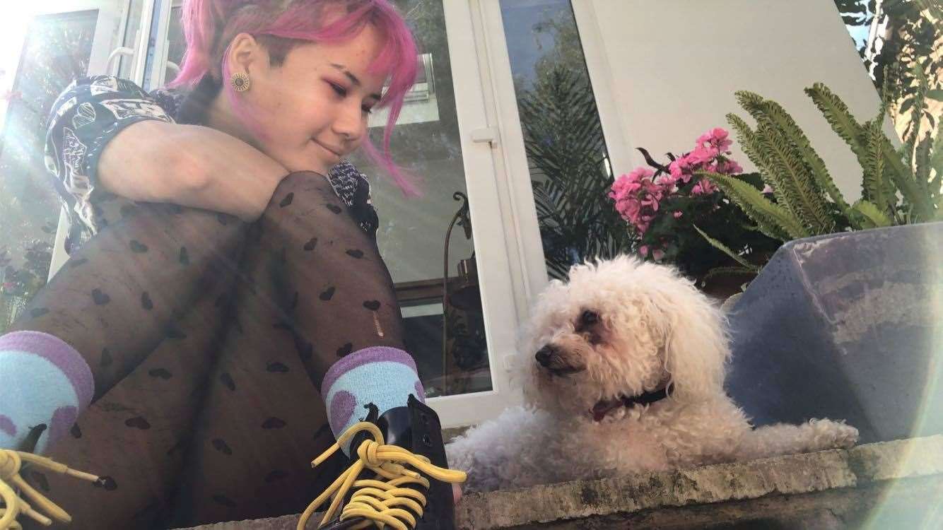 Emily with her beloved bichon frise, Lily. Picture: Rebecca Set