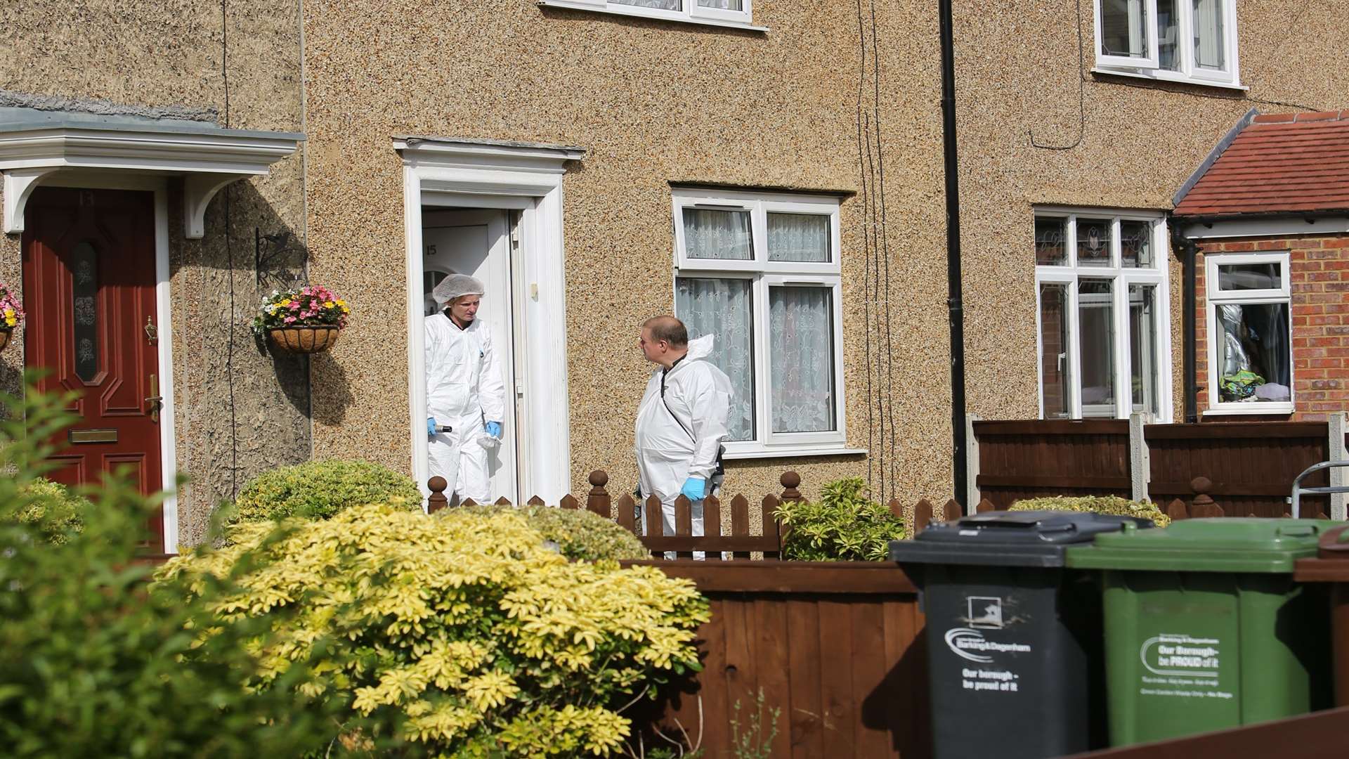 Forensic officers at the Dagenham home of Gary Pocock