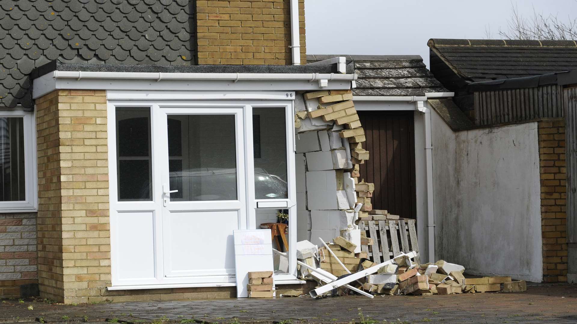 The car which was being chased by police crashed into this house in Wells Way