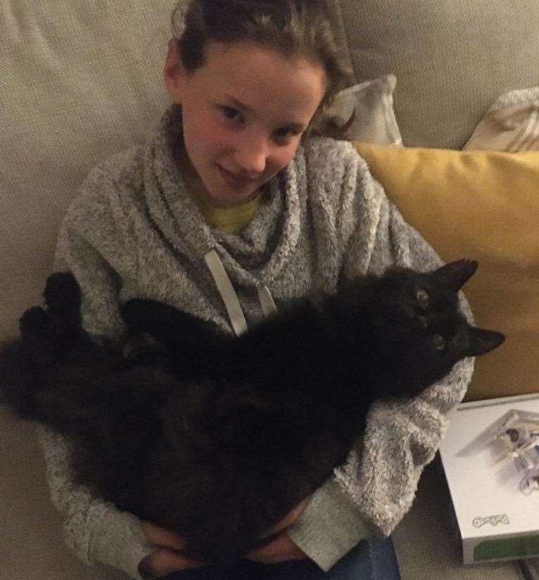 Noah enjoying his favourite kind of cuddle, being cradled like a baby