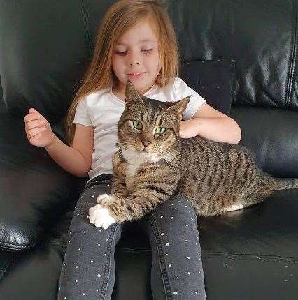 Boots the cat is reunited with his family in Rochester after more than a year