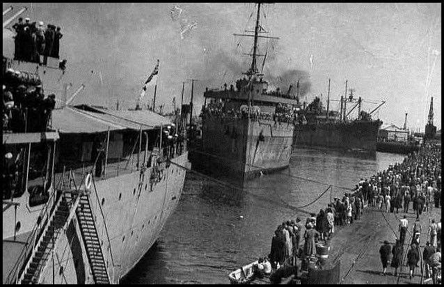 HMS Maidstone arrives in Freemantle Harbour, Australia, September 1945 with rescued POWs on board.  Image COFEPOW