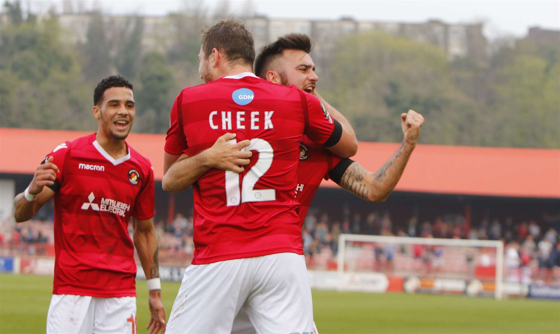 Michael Cheek celebrates with Corey Whitely and Jack Payne Picture: Andy Jones