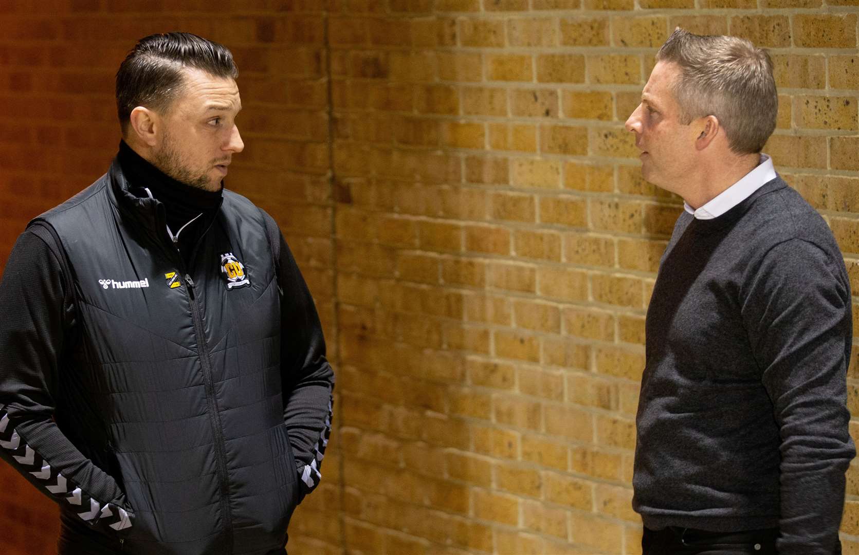 Mark Bonner chats to former Gillingham manager Neil Harris Picture: Julian_KPI
