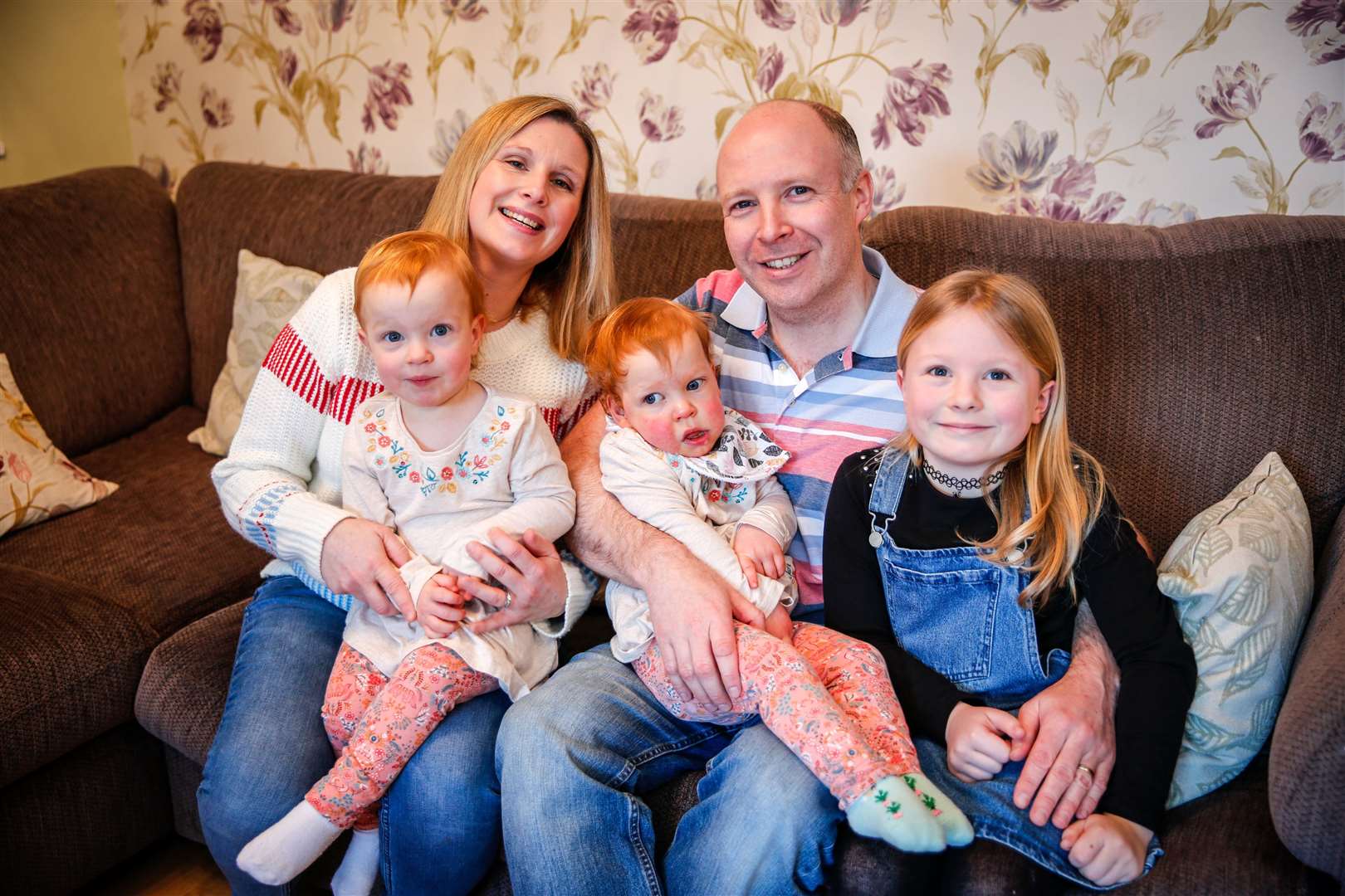 Gary and Lucy Toner with children Meghan, seven, and twins Evie and Esme, aged two. Picture: Matthew Walker