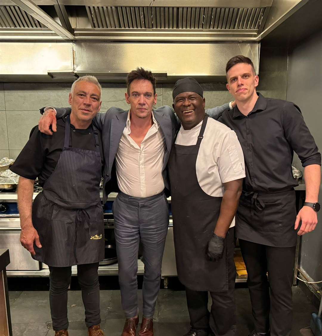 Actor Jonathan Rhys-Meyers thanks chefs(from left), Osvaldo Mena, Manolo Luque and waiter Emil Kostsdinov