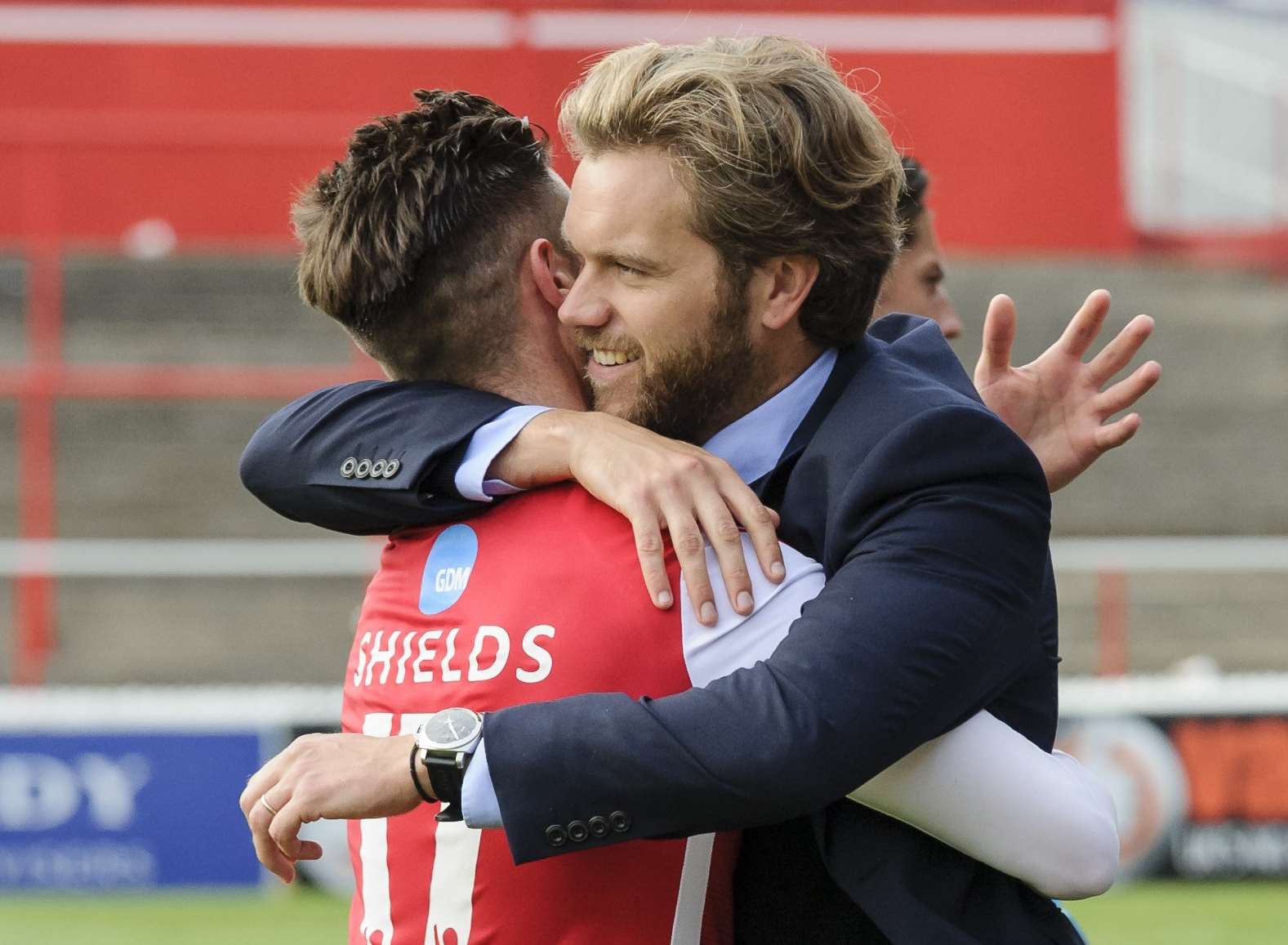 Sean Shields embraces his manager Daryl McMahon Picture: Andy Payton