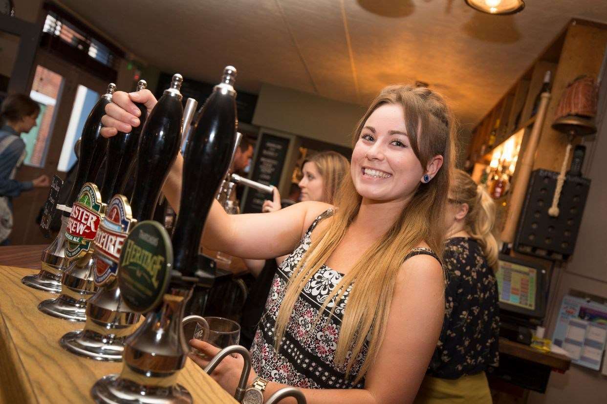 Ciara Lonergan pulls a pint at Canterbury's Old City Bar