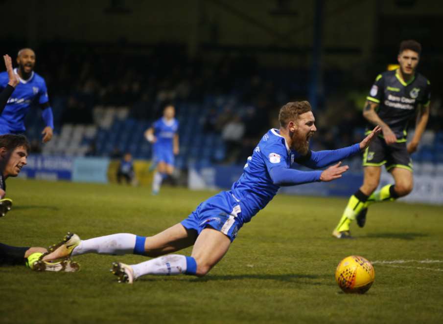 Scott Wagstaff is fouled for Gills' first penalty Picture: Andy Jones