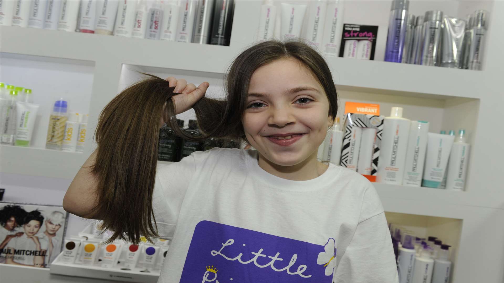 Obsessions Hair, York Street, Ramsgate. Eight-year-old Faith Cunningham before having her hair cut for charity