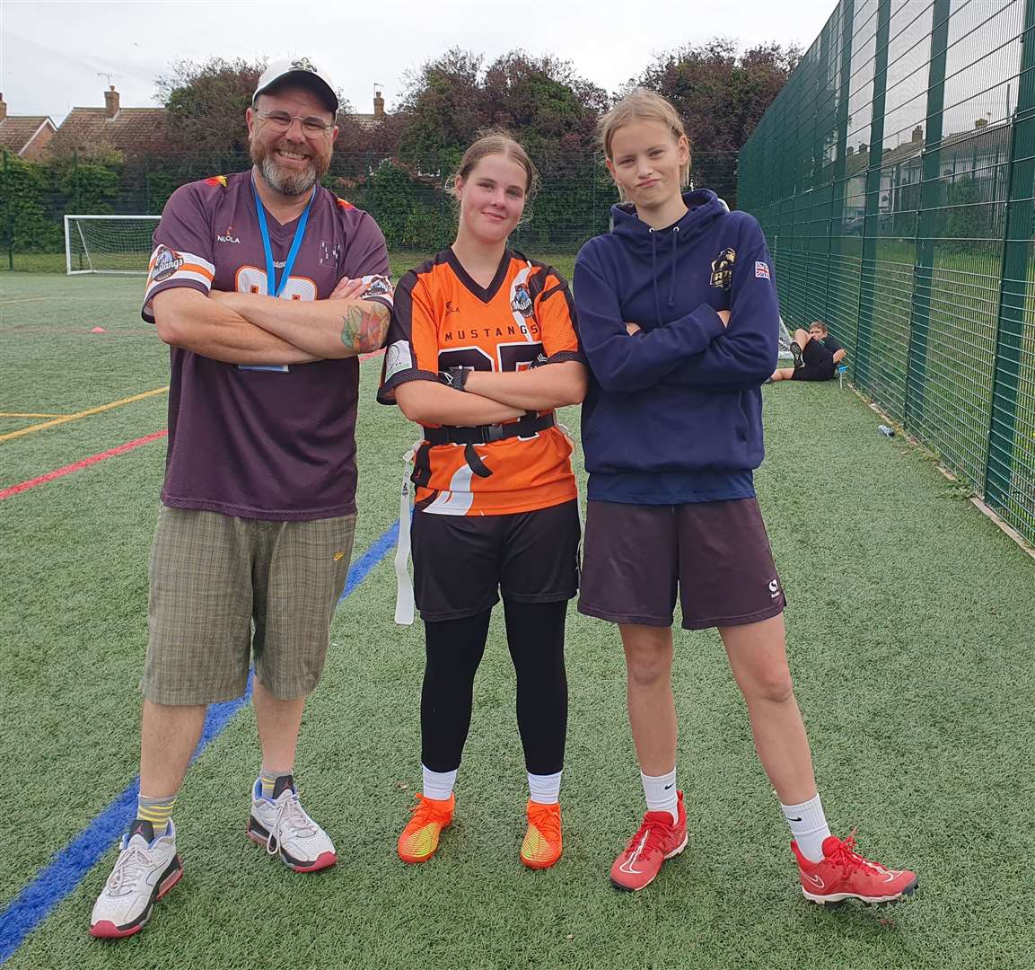 Thanet Mustangs coach Phil Cartwright with players Darna Kelleher and Matilda Deakins