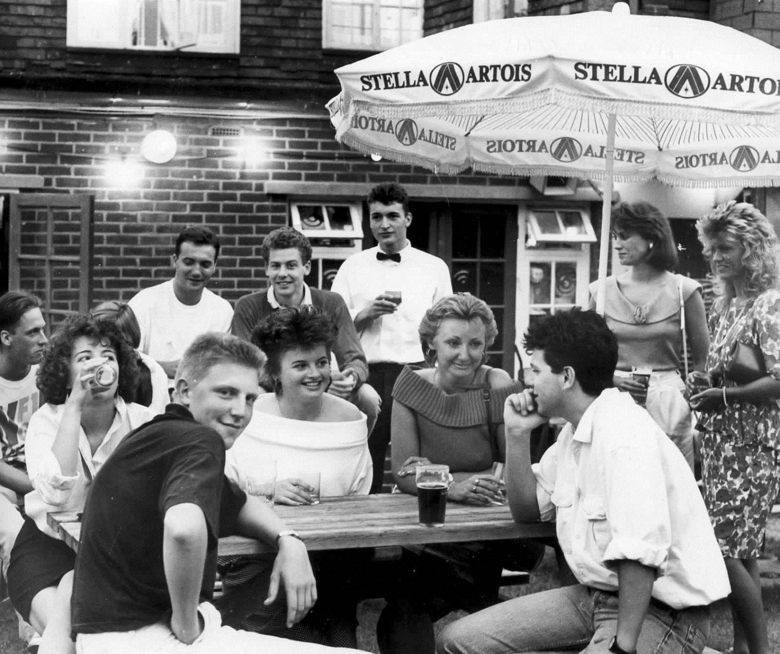 Punters at The Bull pub in Penenden Heath, near Maidstone, in August 1988