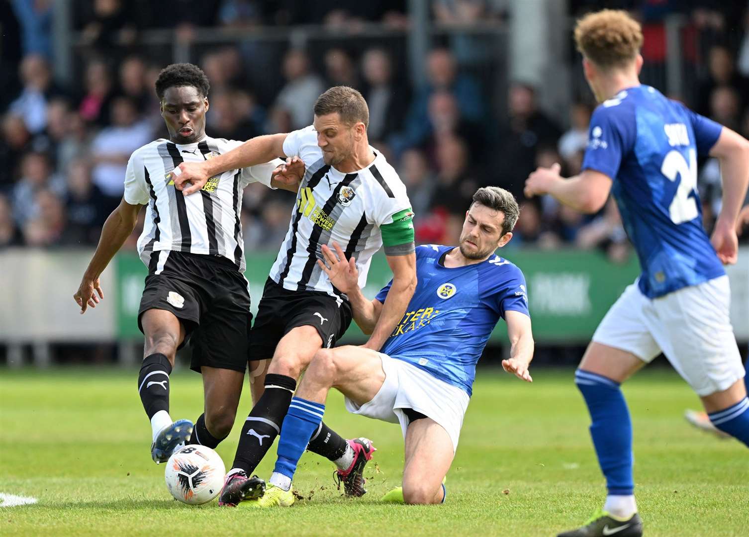 Captain Tom Bonner wins the ball for Dartford during Sunday’s play-off clash. Picture: Keith Gillard