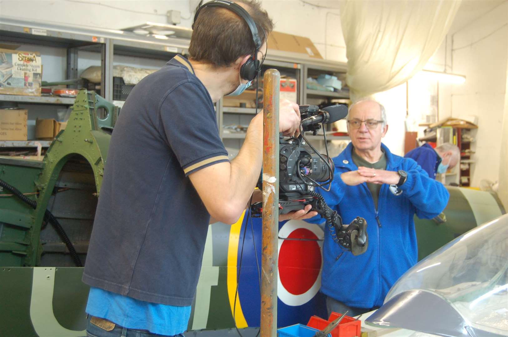 Maps' managing director Philip Cole shows a cameraman their work