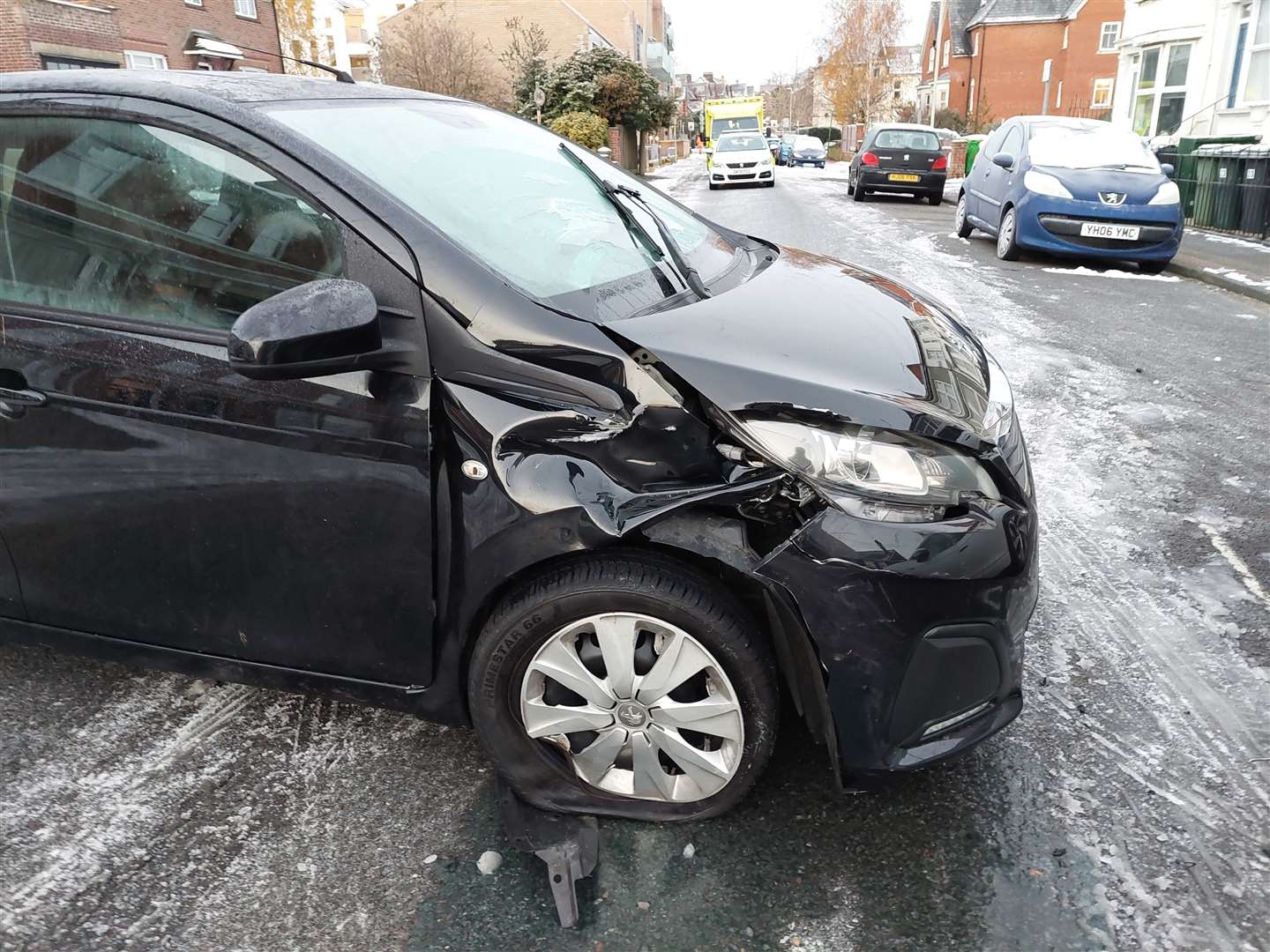 The Peugeot 108 was broadside across the road