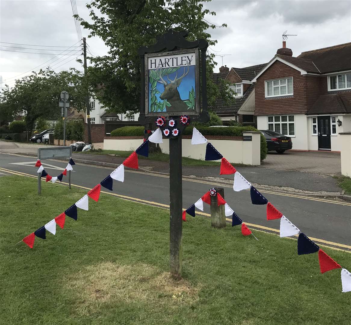 Hartley WI knitted bunting and settled the Queen and her corgies on the green before it was destroyed. Picture: Kay Turner